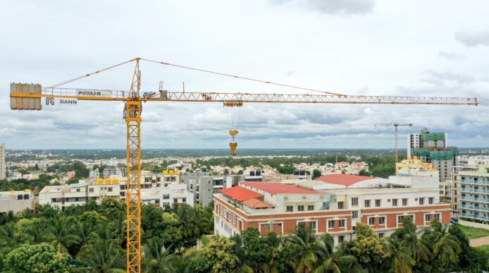 Rann Infra Equipment Tower Crane rented by SV Prime for residential development in Whitefield, Bengaluru